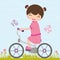 Little girl on a bicycle
