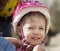 Little girl in a bicycle helmet