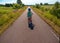 Little girl on the bike in Swedish landscape