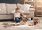 Little girl with book and her favorite toy at home