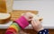 Little girl breaks bread on a close-up table