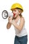 Little girl builder in yellow helmet screaming into the loudspeaker