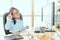 Little girl business worker sitting in workplace