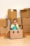 Little girl in cardboard box - moving concept