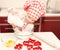 Little girl with chef hat put flour