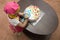 Little girl children decorate cream cake