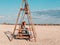 Little girl chilling resting in beach chair Happy child smiling relaxing enjoying life sun fresh air. Autumn travel