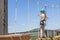 Little girl climbing on an outdoor ropes course