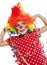 Little girl with clown costume