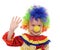 Little girl in a clown costume waving