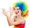 Little girl in clown wig fooling around