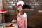 Little girl cook real pizza