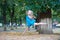 Little girl dancer jump in summer park