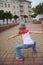 Little girl dancing on the street