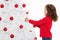 Little girl decorating a christmas tree