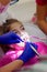 Little girl at dentist`s appointment. Inspection and tooth being treated