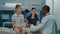 Little girl and doctor doing medical consultation in office