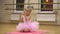 Little girl doing some ballet exercises in the choreography class