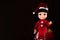 Little girl doll , wearing Santa\'s hat