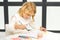 Little girl draws paints.montessori education.