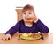 Little girl eat toast bread and tuna fish