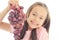 Little girl eating grape