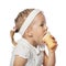 Little girl eating icecream on white