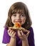 A little girl eating a pizza