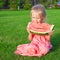 Little girl eating a ripe juicy watermelon in