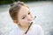 Little girl eating roasted marshmallow