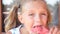 Little girl eating watermelon summer outdoors