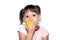 Little girl eats yellow fruit