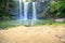 Little girl enjoying Spectacular view of Whangarei Falls, New Zealand