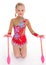 Little girl exercising with gymnastic mace