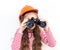 Little girl explorer looking through binoculars