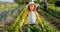 Little girl, farm and agriculture in green harvest for sustainability, organic and production in nature. Portrait of