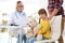 Little girl with father visiting children`s doctor