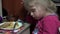 Little Girl Fell Asleep at the Table Eating Potato. 4k Ultra HD