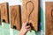 Little girl finding out what is under the question mark wooden s