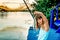 Little girl fishing on the river Bojana in Montenegro