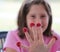 Little girl with five raspberries