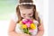 Little girl with flower bouquet