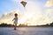 Little girl flying a kite