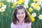 Little Girl in Front of Daffodils
