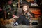 Little girl with gifts near a Christmas tree