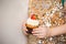 Little girl in a glistening dress holding beautiful cupcake, close up. Bakery, sweet food and people concept. muffin