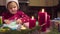 Little girl glues New Year card