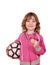 Little girl with golden medal and soccer ball