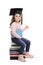 Little girl with a graduation hat giving a thumb up