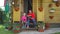 Little Girl with Grandma Reading Book Outdoors